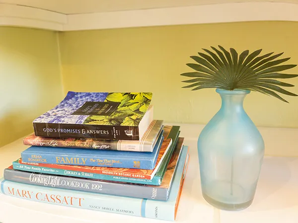 flower vase and books for reading